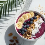 Vibrant acai bowl tropical smoothie with toppings